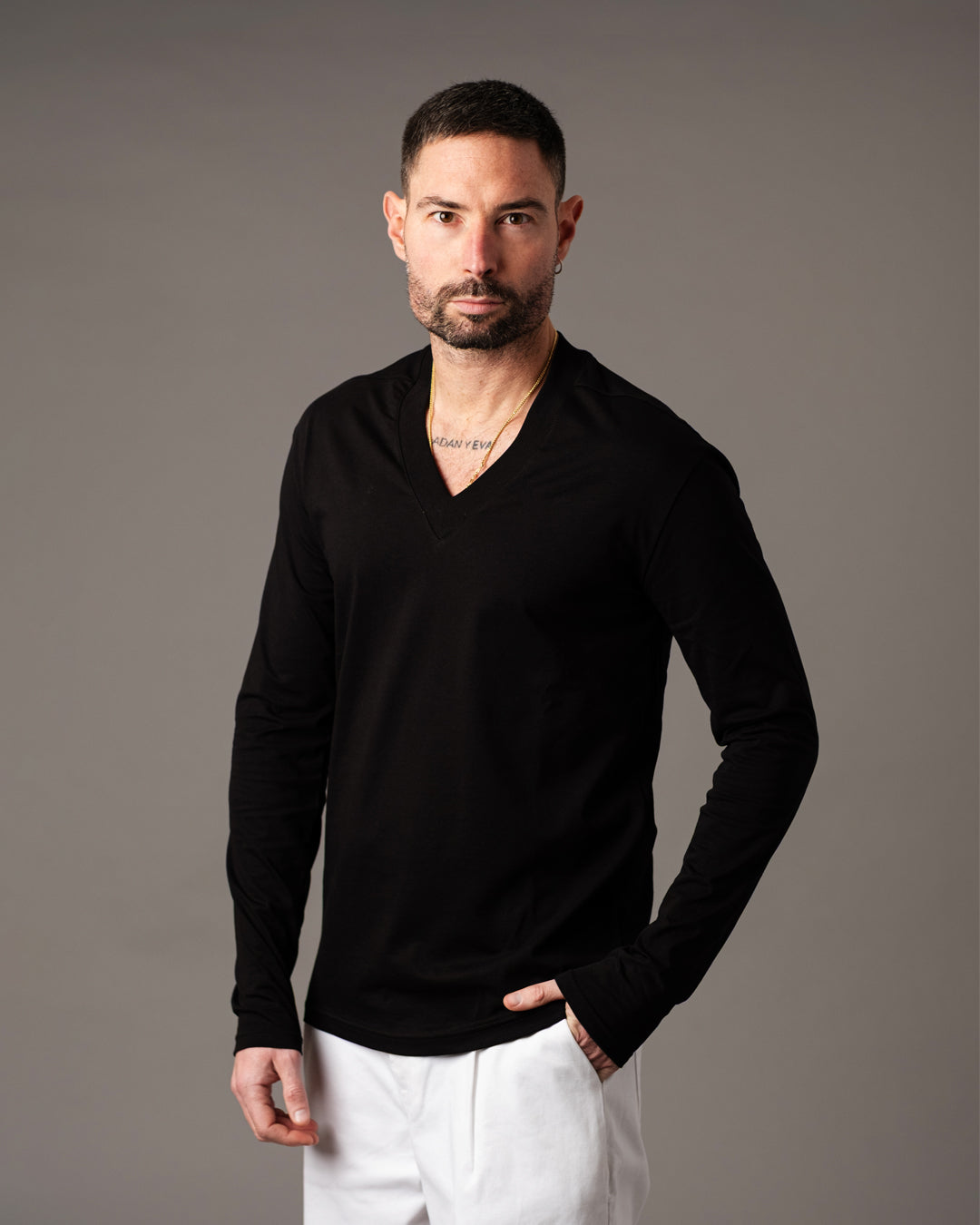 Maglia scolla a punta manica lunga